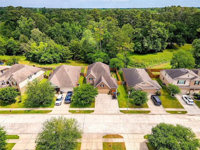 16611 River Wood Ct, Crosby, TX 77532 - aerial view featuring a view of trees and a residential view