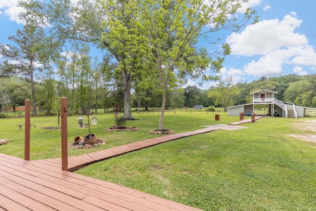 view of yard featuring a wooden deck