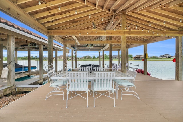 view of dock with a water view and boat lift