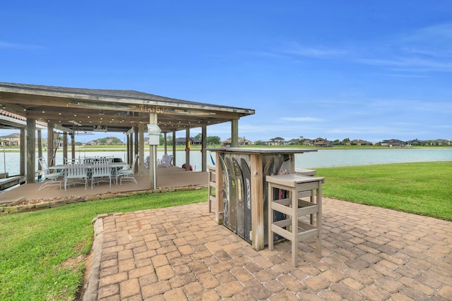 view of patio / terrace featuring a water view