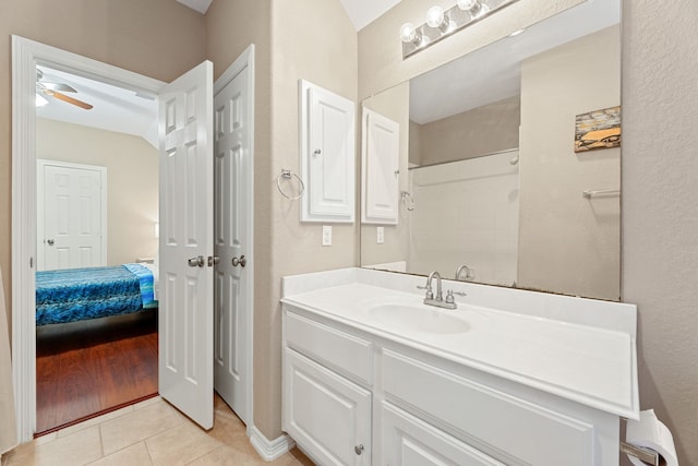 3719 Arundel Gardens Ln, Sugar Land, TX 77498 - bathroom featuring tile patterned flooring, vanity, ensuite bathroom, ceiling fan, and a shower