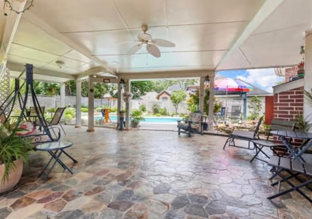 3719 Arundel Gardens Ln, Sugar Land, TX 77498 - view of patio featuring a ceiling fan and fence