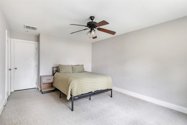 1311 N Diamondhead Blvd, Crosby, TX 77532 - bedroom with baseboards, visible vents, a ceiling fan, and light carpet