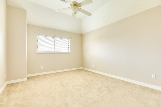 51 Scotch Pine Ct, Lake Jackson, TX 77566 - empty room featuring vaulted ceiling, baseboards, a ceiling fan, and light carpet