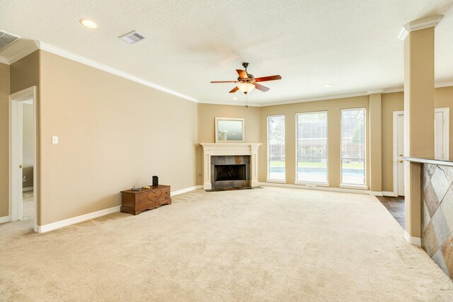 51 Scotch Pine Ct, Lake Jackson, TX 77566 - unfurnished living room with crown molding, carpet flooring, and a fireplace