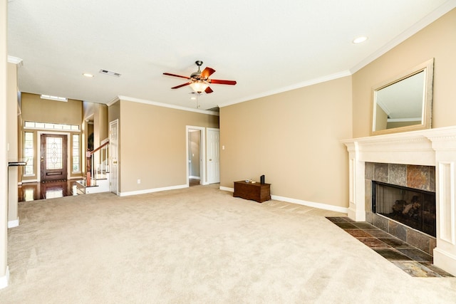 51 Scotch Pine Ct, Lake Jackson, TX 77566 - unfurnished living room featuring carpet flooring, a tiled fireplace, a ceiling fan, visible vents, and ornamental molding