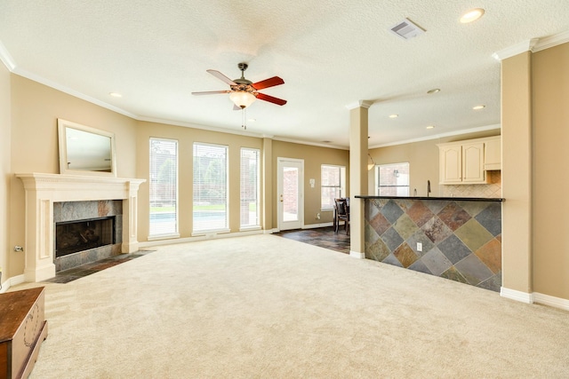 51 Scotch Pine Ct, Lake Jackson, TX 77566 - unfurnished living room with dark colored carpet, ceiling fan, visible vents, and baseboards