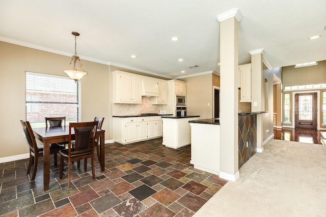 51 Scotch Pine Ct, Lake Jackson, TX 77566 - kitchen featuring decorative backsplash, appliances with stainless steel finishes, dark countertops, baseboards, and custom exhaust hood