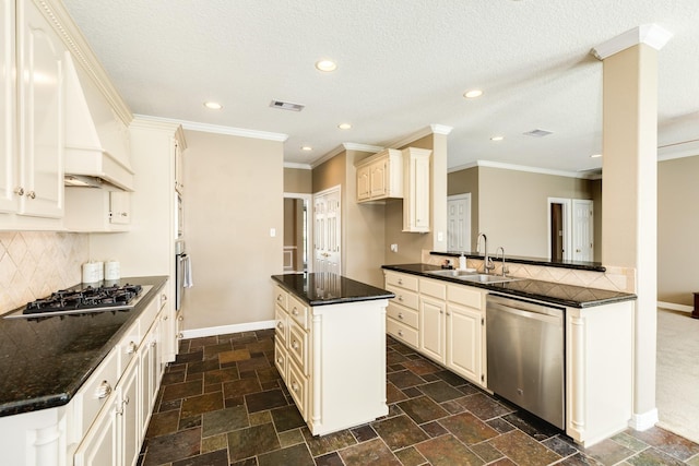 51 Scotch Pine Ct, Lake Jackson, TX 77566 - kitchen with recessed lighting, stone tile flooring, appliances with stainless steel finishes, a sink, and visible vents