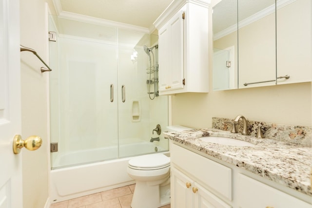 51 Scotch Pine Ct, Lake Jackson, TX 77566 - full bath with tile patterned floors, toilet, ornamental molding, shower / bathing tub combination, and vanity