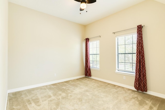 51 Scotch Pine Ct, Lake Jackson, TX 77566 - empty room featuring baseboards, a ceiling fan, and light colored carpet