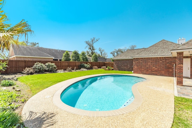 51 Scotch Pine Ct, Lake Jackson, TX 77566 - view of swimming pool with a fenced in pool, a lawn, a patio area, and a fenced backyard