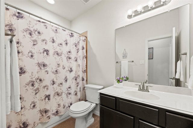 13215 Dover Bluff Dr, Rosharon, TX 77583 - bathroom featuring toilet, vanity, and tile patterned flooring