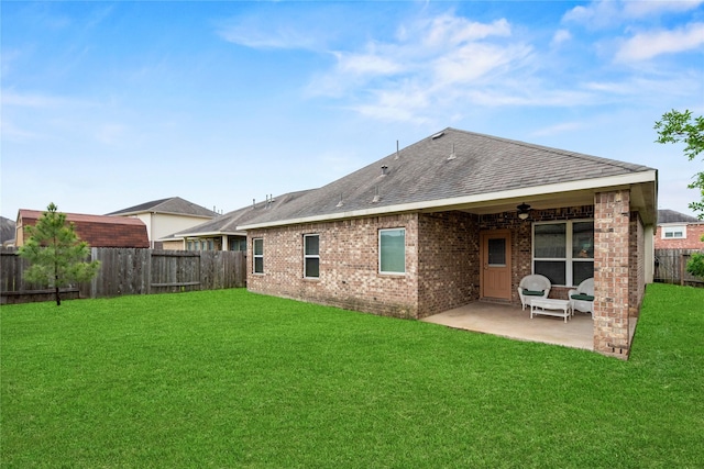 13215 Dover Bluff Dr, Rosharon, TX 77583 - rear view of property with a patio area, a ceiling fan, brick siding, and roof with shingles