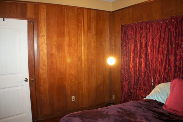 4334 Bell St, Houston, TX 77023 - bedroom featuring wooden walls