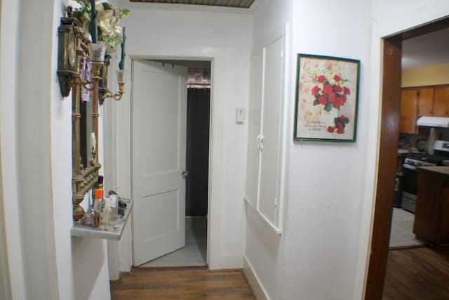 hall with wood finished floors