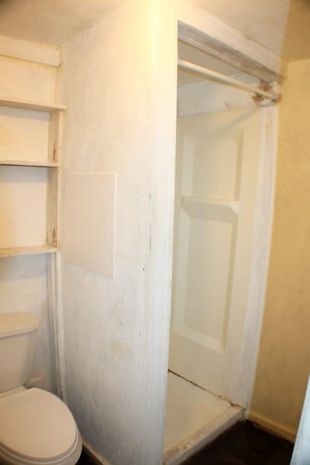 4334 Bell St, Houston, TX 77023 - bathroom with a shower stall and toilet