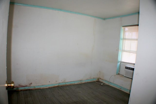 4334 Bell St, Houston, TX 77023 - empty room featuring wood finished floors and cooling unit
