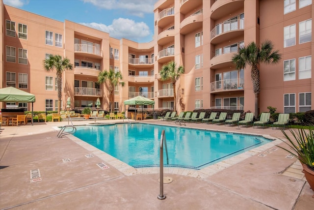 pool with a patio area