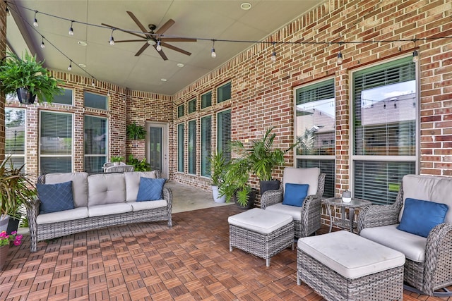 view of patio / terrace with an outdoor living space and ceiling fan