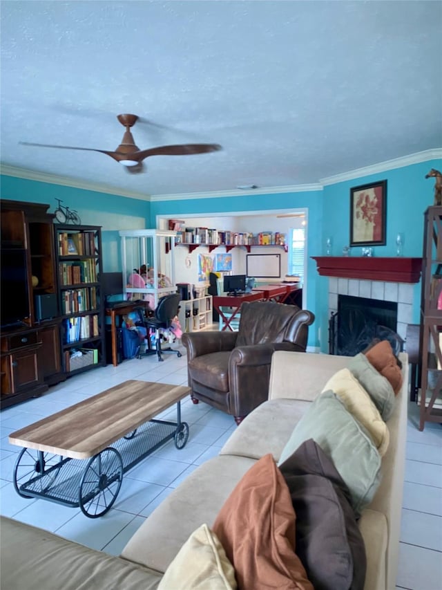 2106 Cherry Hills Dr, League City, TX 77573 - tiled living area featuring a tiled fireplace, ornamental molding, and a ceiling fan