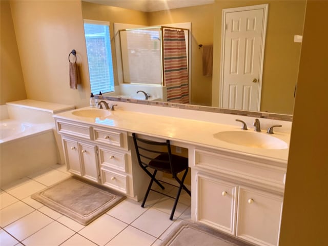 2106 Cherry Hills Dr, League City, TX 77573 - full bath with a garden tub, a stall shower, double vanity, and a sink