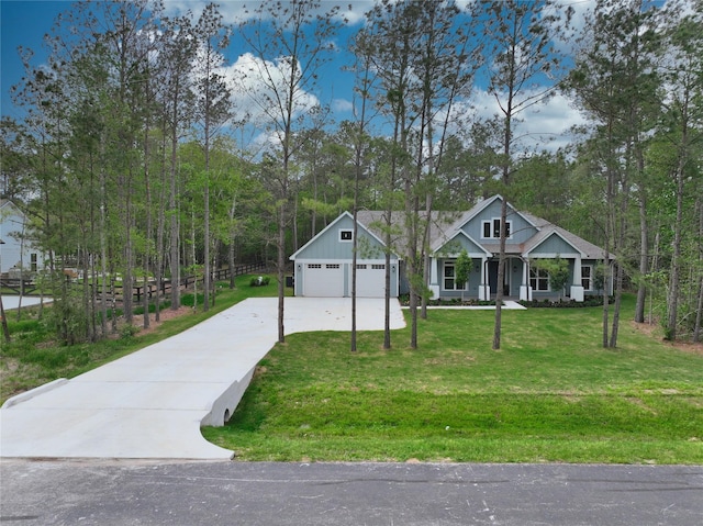 17522 Julianne Dr, Waller, TX 77484 - view of front facade with a front lawn and concrete driveway