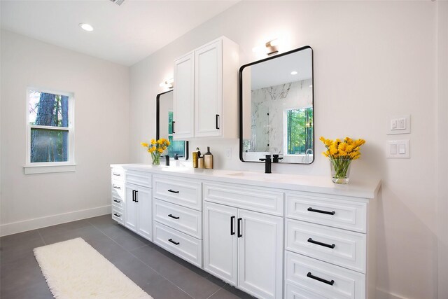 17522 Julianne Dr, Waller, TX 77484 - bathroom with recessed lighting, vanity, a marble finish shower, baseboards, and tile patterned flooring