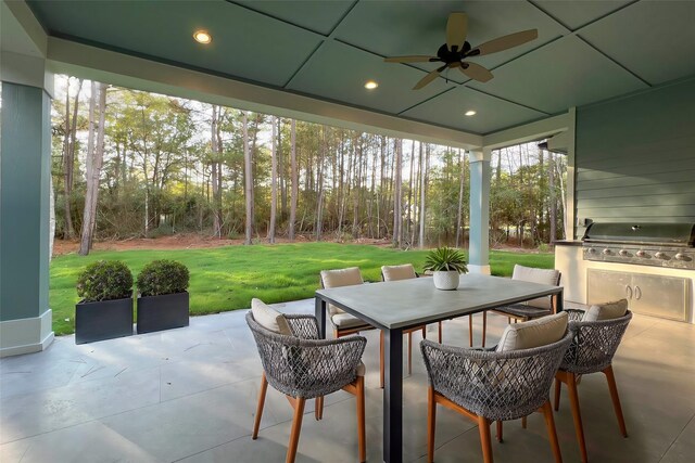 17522 Julianne Dr, Waller, TX 77484 - view of patio featuring outdoor dining space, grilling area, ceiling fan, and an outdoor kitchen