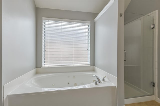 7403 Hickory Canyon Ct, Humble, TX 77396 - bathroom featuring a whirlpool tub and a stall shower
