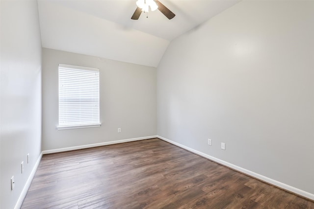7403 Hickory Canyon Ct, Humble, TX 77396 - empty room featuring lofted ceiling, a ceiling fan, dark wood finished floors, and baseboards