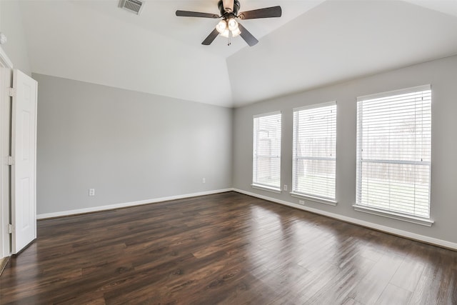 7403 Hickory Canyon Ct, Humble, TX 77396 - unfurnished room featuring dark wood-style floors, visible vents, ceiling fan, and lofted ceiling
