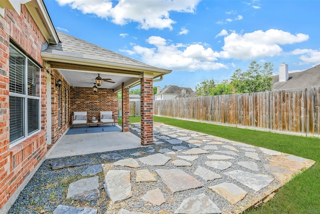 7403 Hickory Canyon Ct, Humble, TX 77396 - view of patio with ceiling fan and a fenced backyard