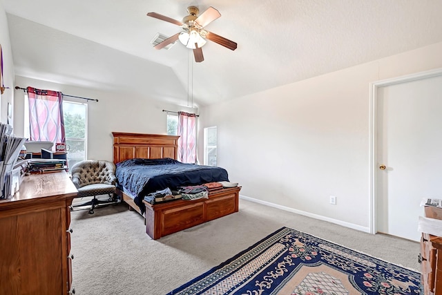 bedroom featuring baseboards, a ceiling fan, carpet flooring, and vaulted ceiling