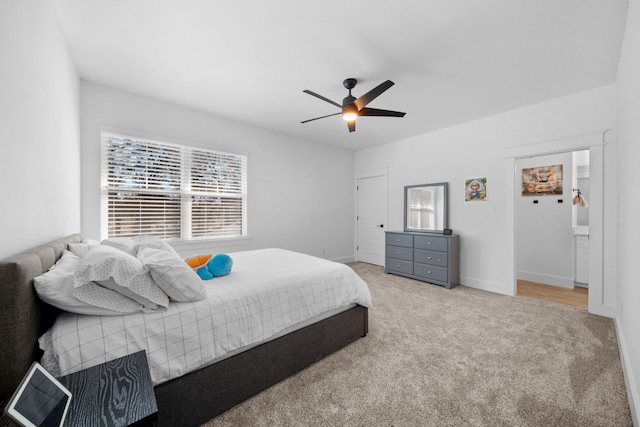 31 Quiet Springs Trl, Willis, TX 77378 - bedroom with carpet floors, baseboards, and a ceiling fan