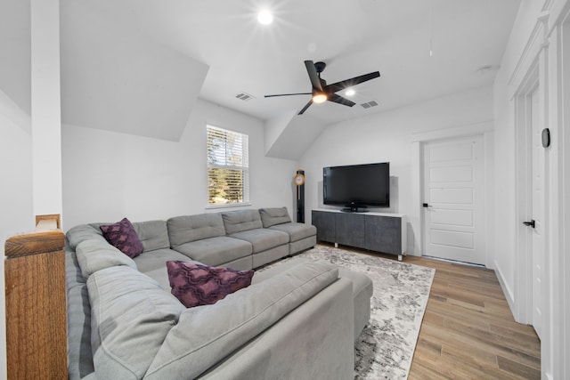 31 Quiet Springs Trl, Willis, TX 77378 - living area with light wood-type flooring, a ceiling fan, and vaulted ceiling