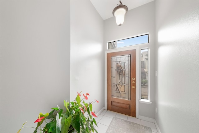 452 Mariners Dr, Kemah, TX 77565 - entrance foyer with light tile patterned flooring and baseboards