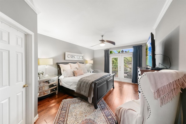 452 Mariners Dr, Kemah, TX 77565 - bedroom featuring wood finished floors, ceiling fan, crown molding, and access to exterior
