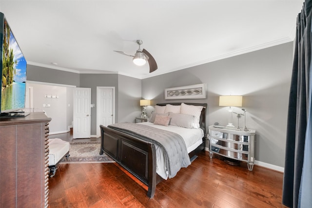 452 Mariners Dr, Kemah, TX 77565 - bedroom with wood finished floors, ceiling fan, crown molding, and baseboards