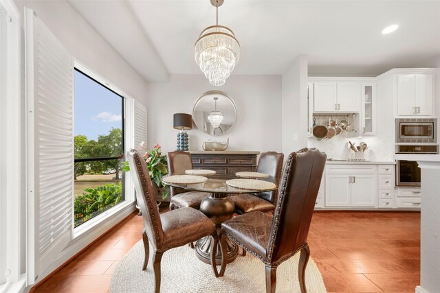 452 Mariners Dr, Kemah, TX 77565 - dining space featuring recessed lighting and a notable chandelier