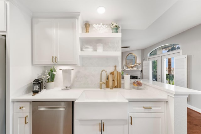 452 Mariners Dr, Kemah, TX 77565 - interior space featuring a sink, open shelves, light countertops, dishwasher, and white cabinets