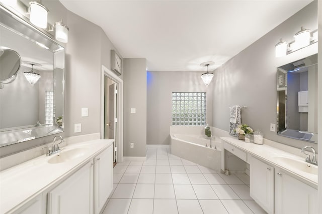 452 Mariners Dr, Kemah, TX 77565 - bathroom with plenty of natural light, a garden tub, and a sink