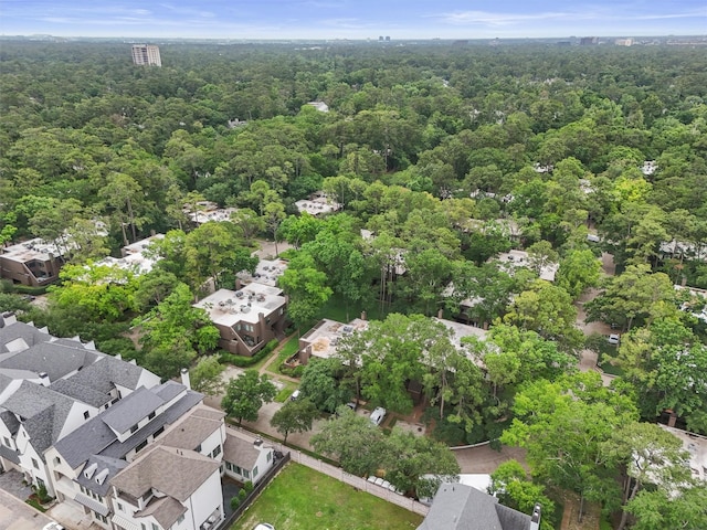 aerial view featuring a residential view and a view of trees