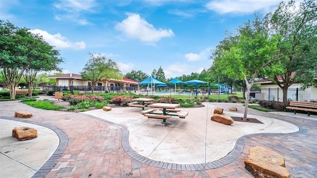 surrounding community featuring fence
