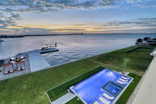 exterior space with a water view