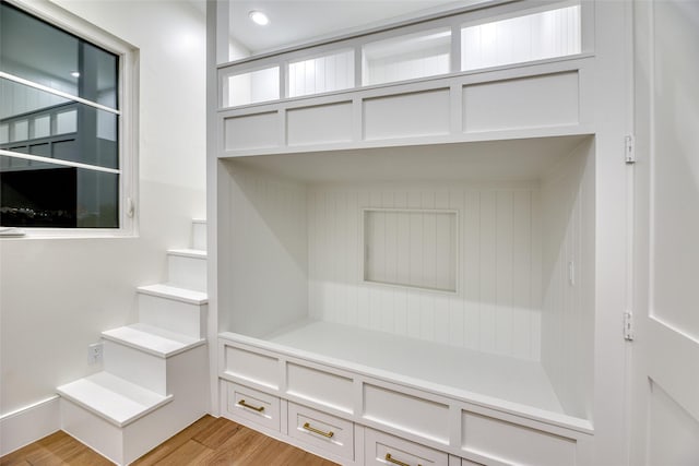 mudroom with light wood-type flooring and recessed lighting