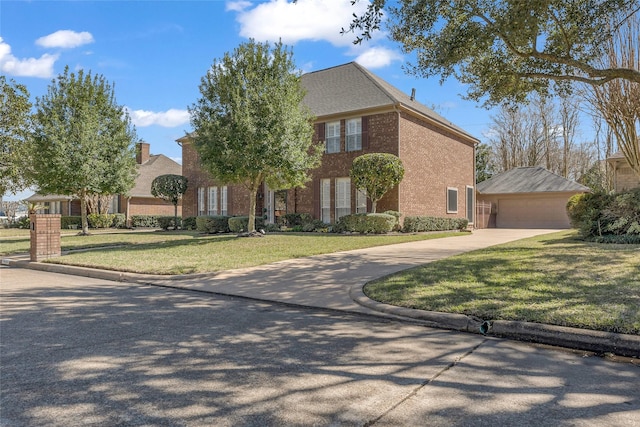 14203 Verde Mar Ln, Houston, TX 77095 - view of front of home featuring brick siding, a front yard, and a garage