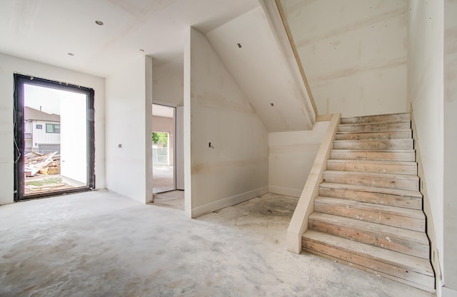 6510 Sivley St, Houston, TX 77055 - stairway with lofted ceiling and concrete floors