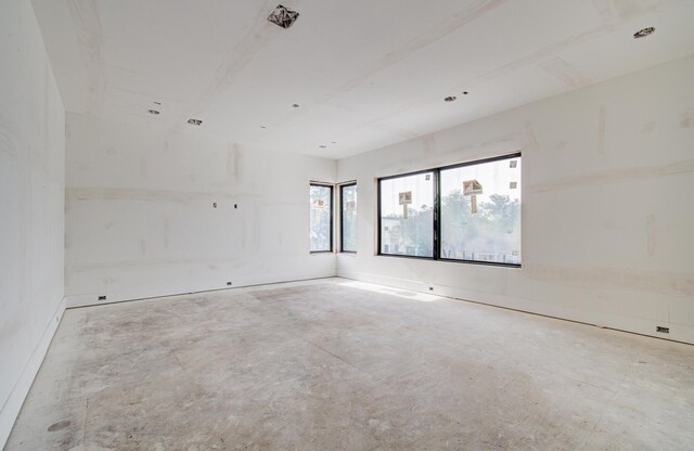 6510 Sivley St, Houston, TX 77055 - spare room with concrete floors