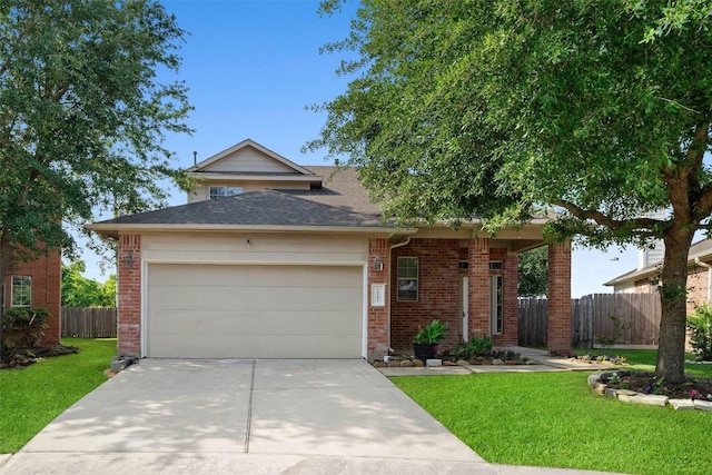 view of front of house featuring fence, a front yard, and brick siding